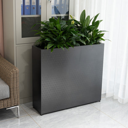 Large_rectangular_mirrored_black_planter_in_an_indoor_setting