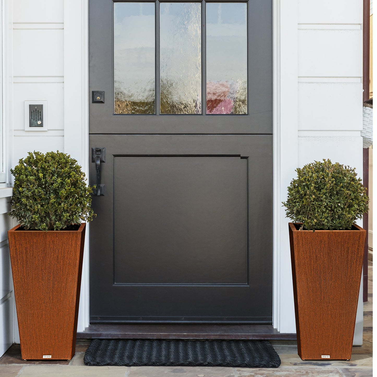 Tall_tapered_corten_steel_planter_for_front_door_decoration