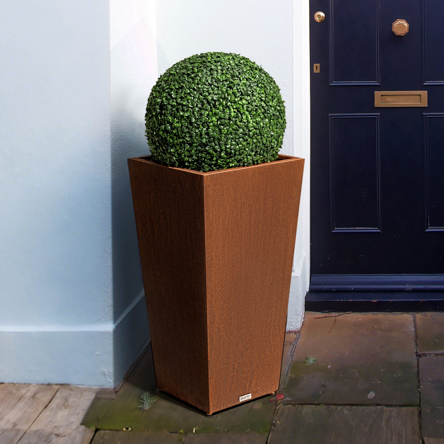 Tall_tapered_corten_steel_planter_in_outdoor_setting