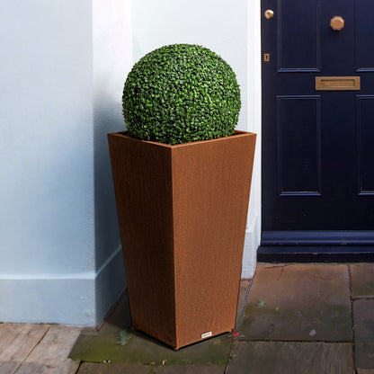 Tall_tapered_corten_steel_planter_in_outdoor_setting