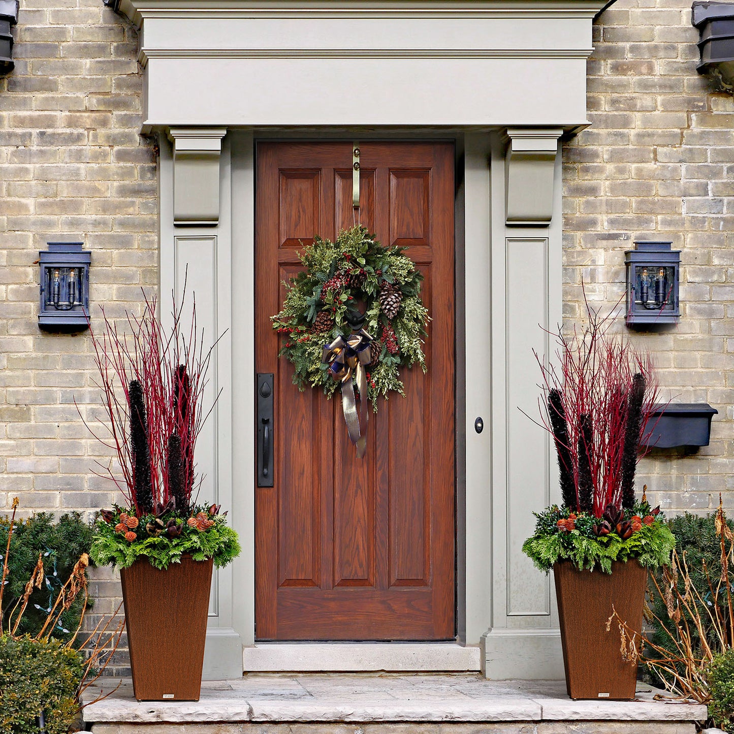Tall_tapered_corten_steel_planter_on_front_porch